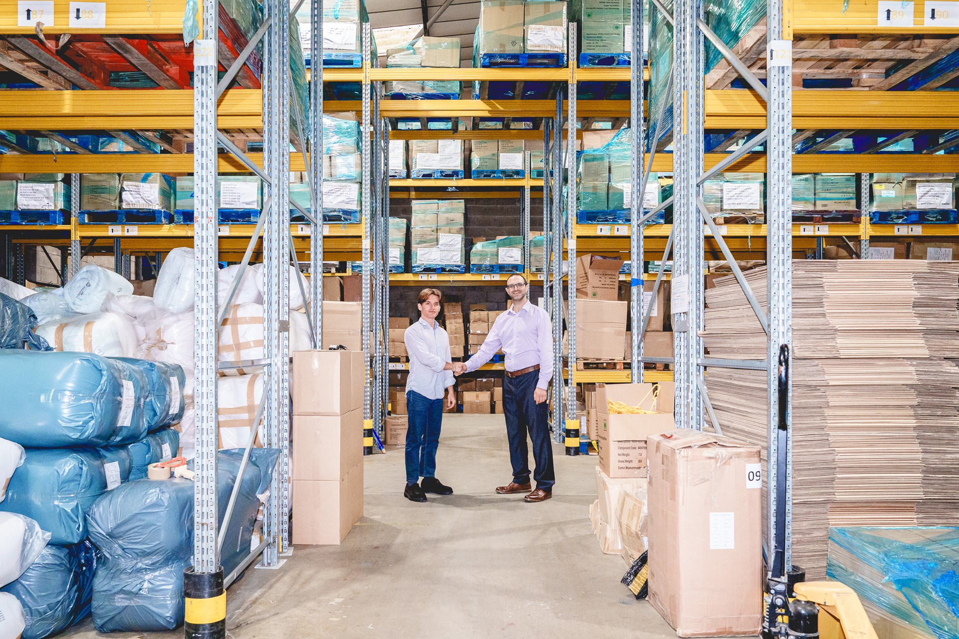 Sonny & Brett Shaking Hands In The Warehouse